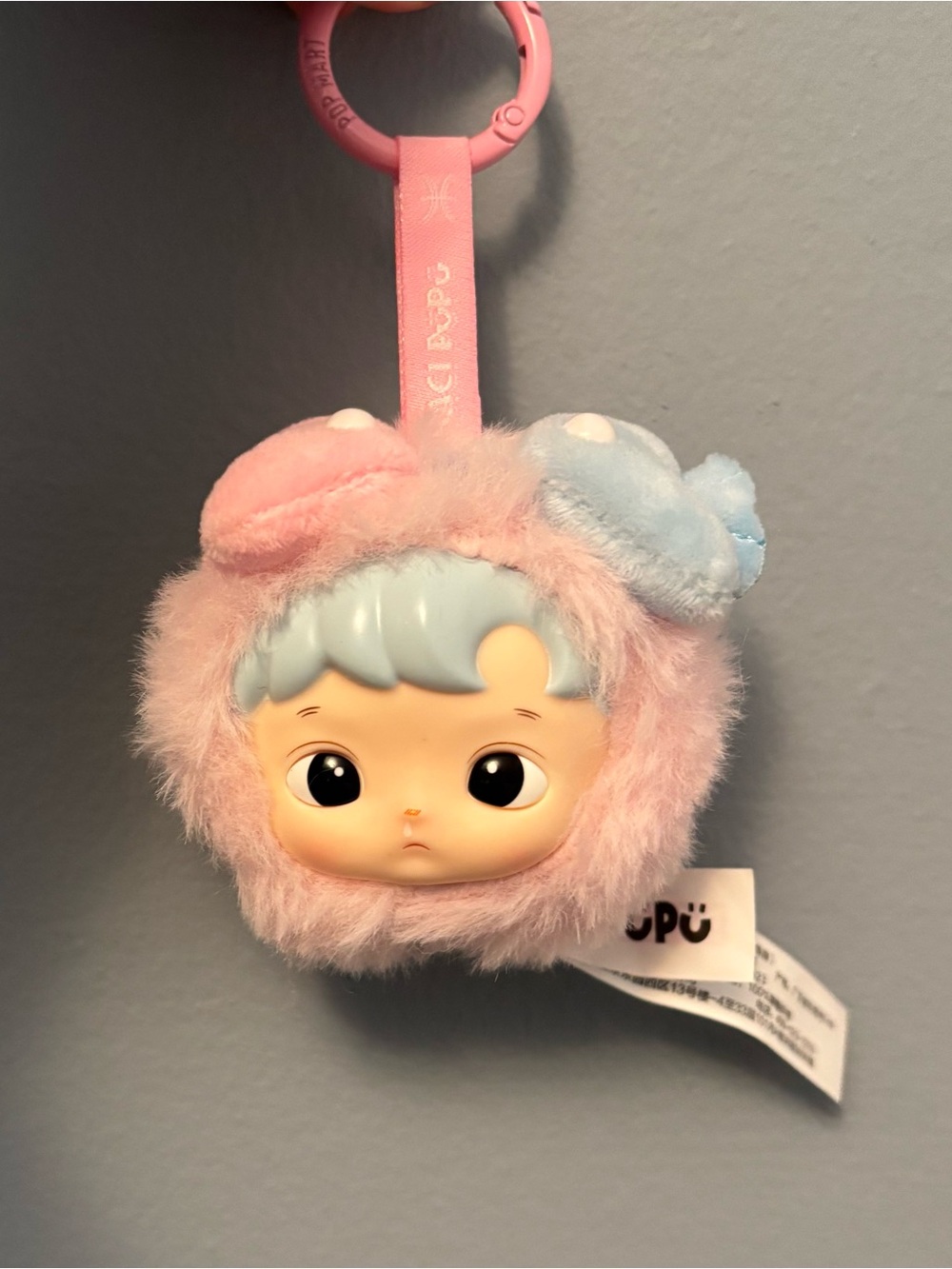 Plush Pink Baby-Face Keychain with Light Blue Hair Accent - Unbranded
